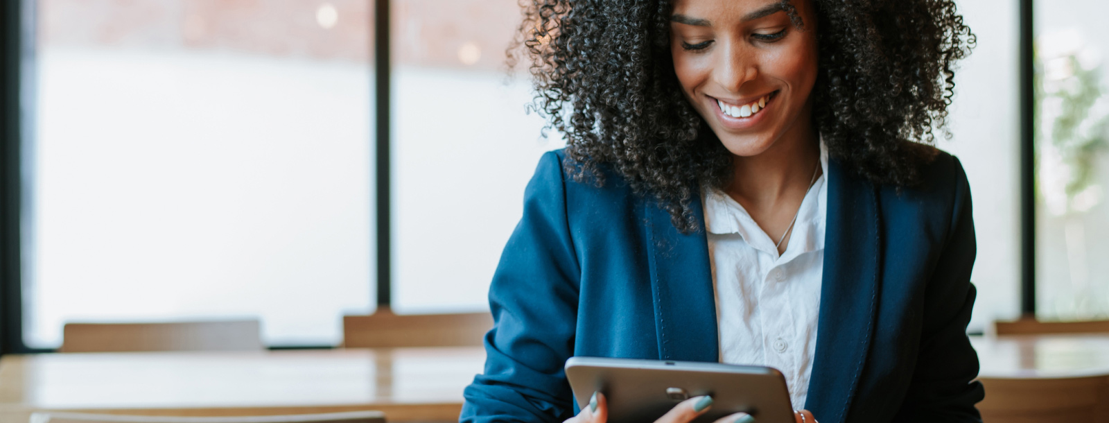 business person using tablet